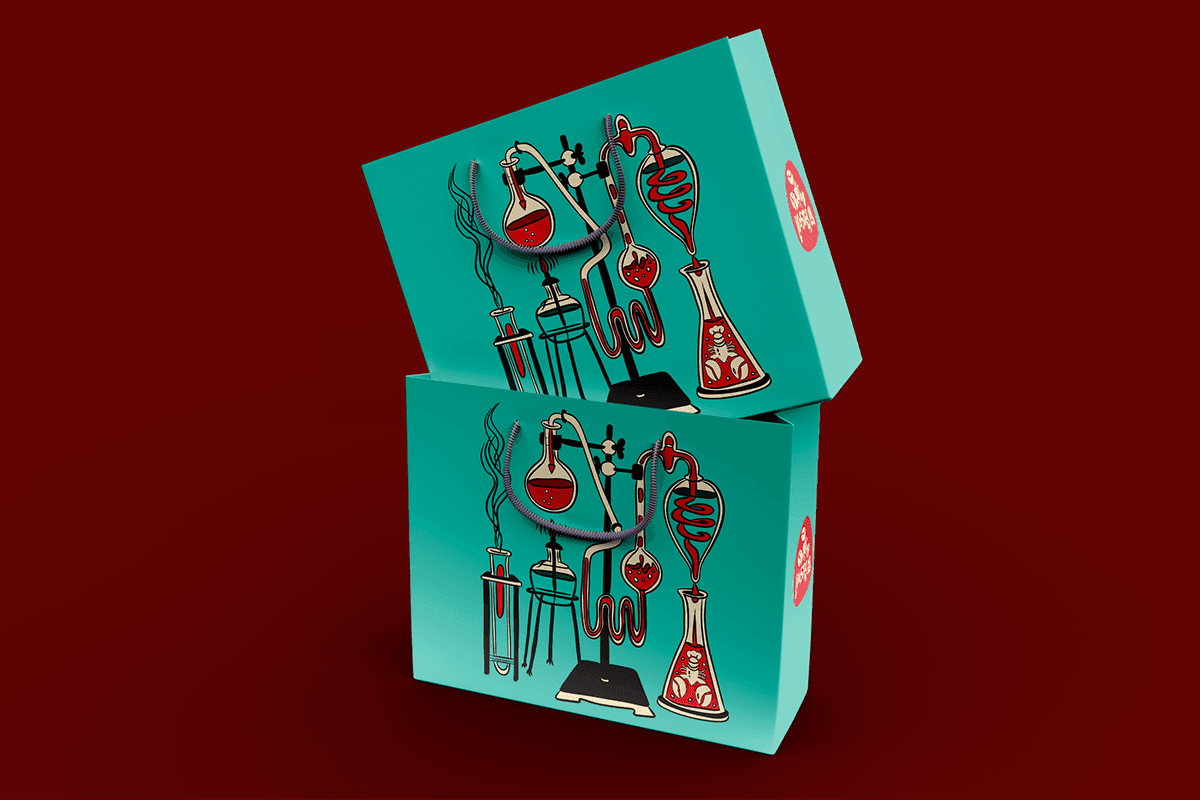 Lobster Lab stacked takeout boxes — teal with retro lab illustration on dark red background | Brand identity by Black Rabbit Creative