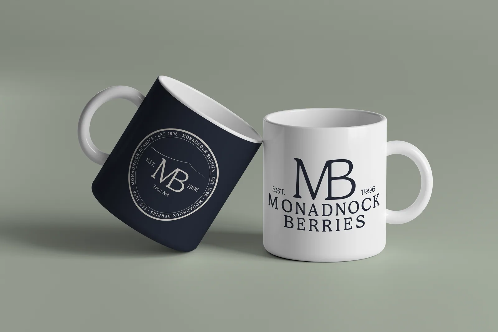 Monadnock Berries branded mugs in navy and white